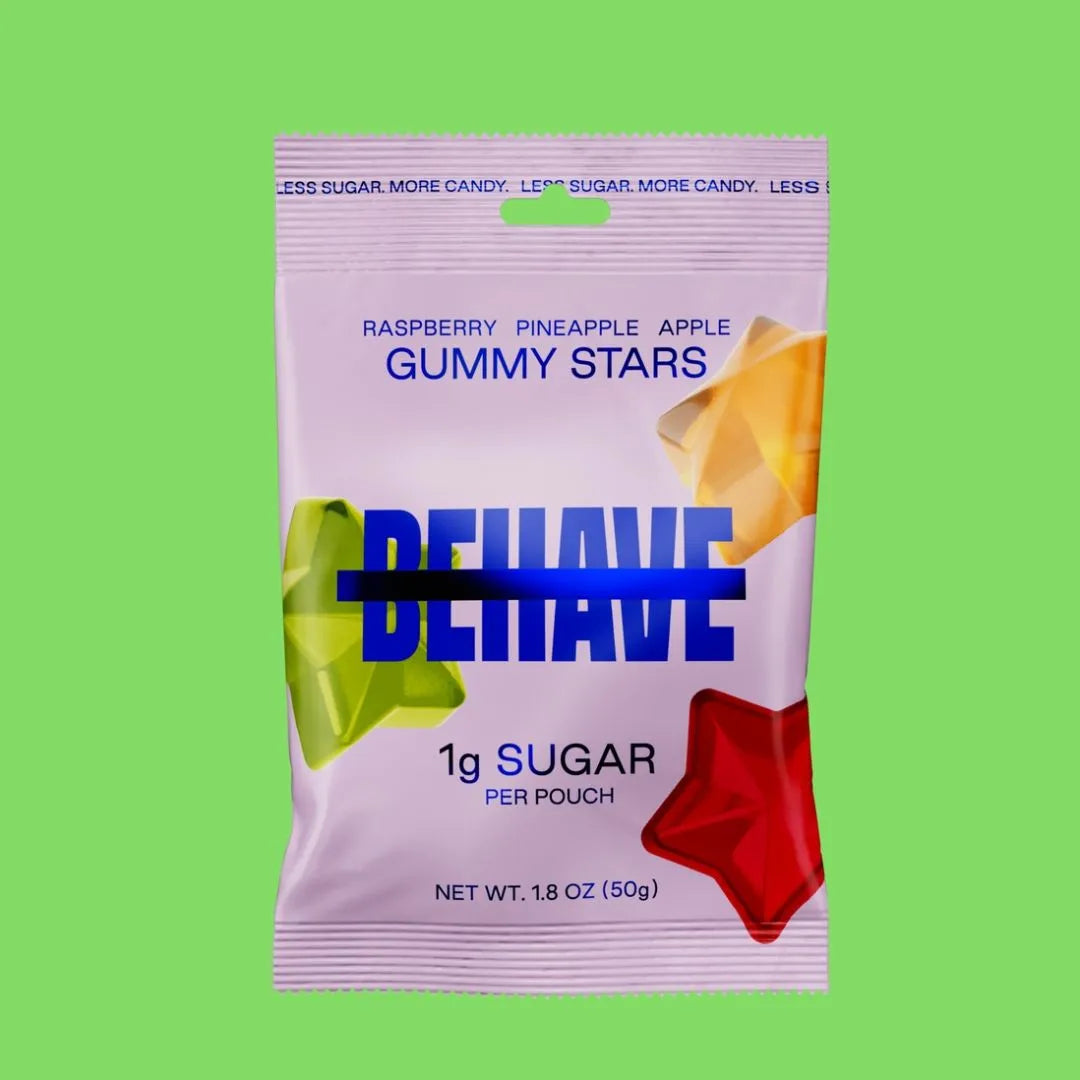 A package of BEHAVE gummy stars with flavors raspberry, pineapple, and apple, labeled as having 1g sugar per pouch.