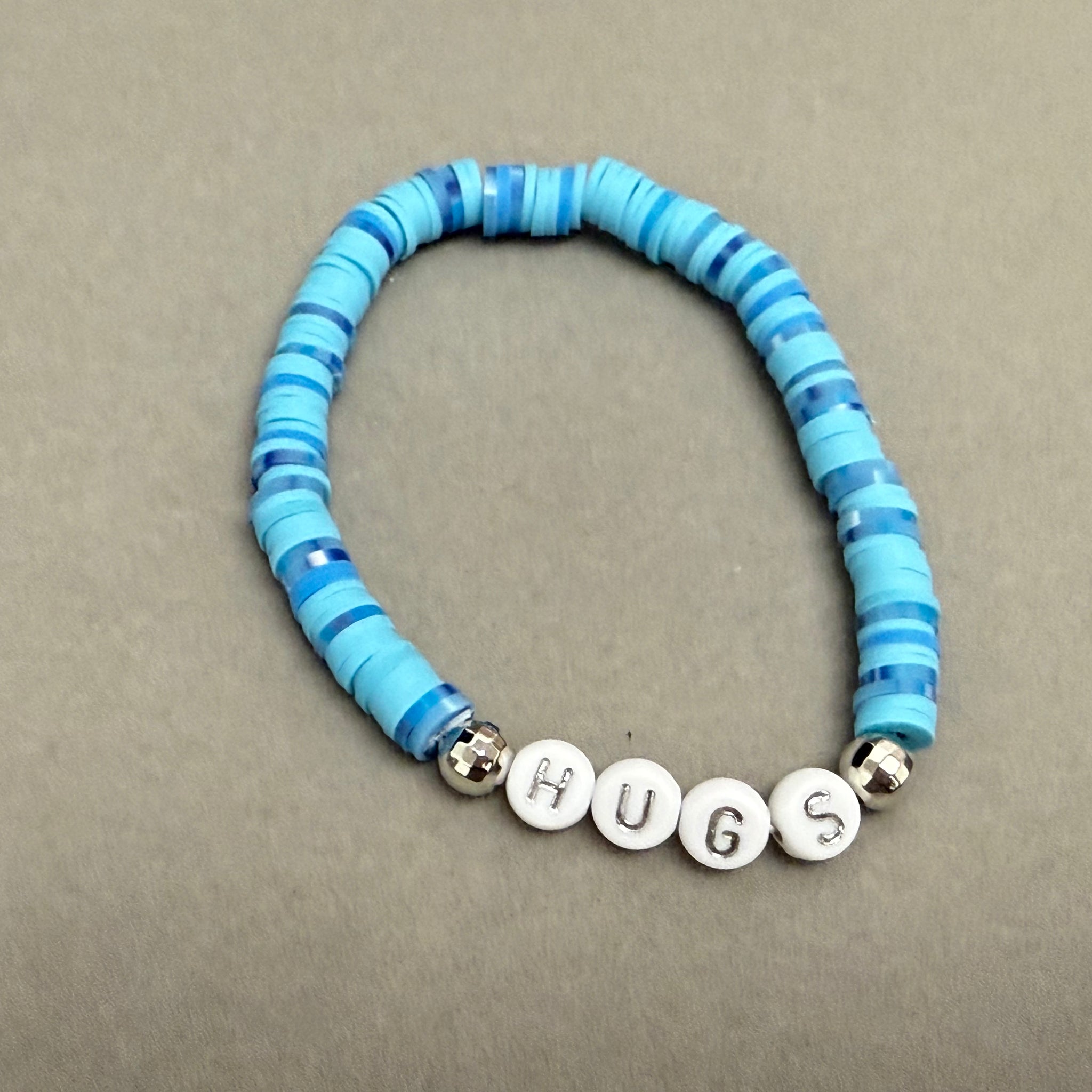 Hugs light blue clay bracelet