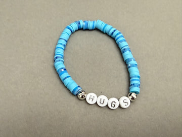 Hugs light blue clay bracelet