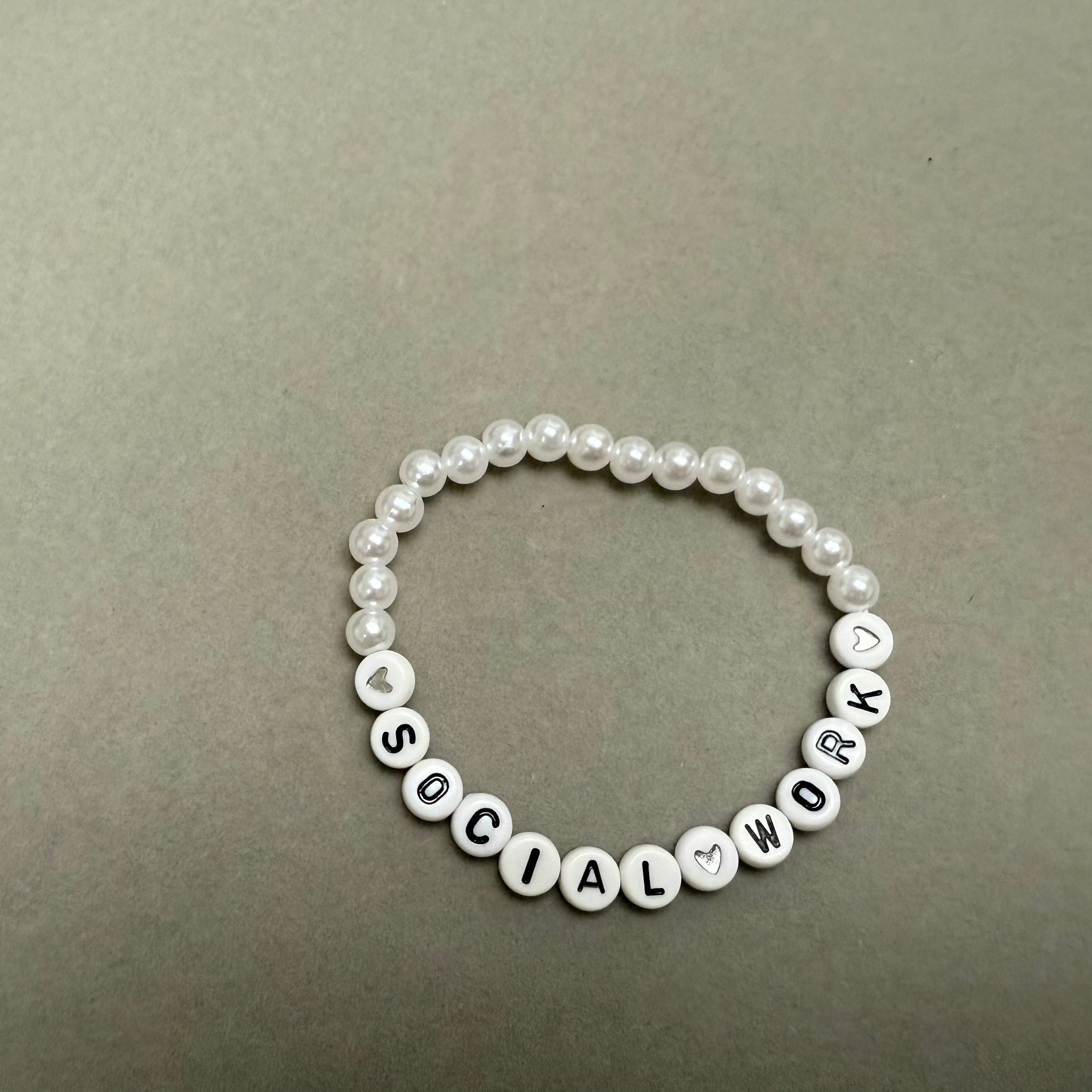 Social work heart with white beads