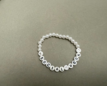 Social work heart with white beads