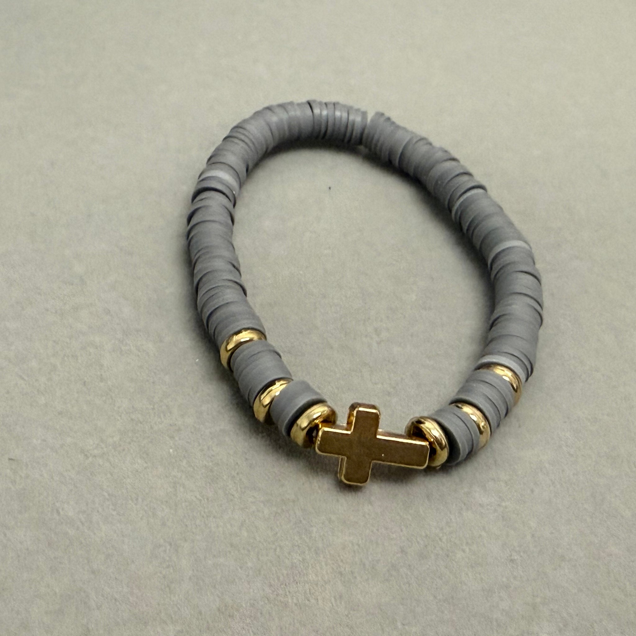 Gray gold cross bracelet