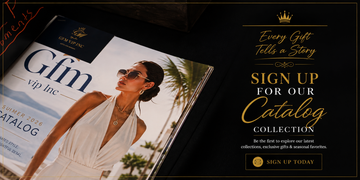 A promotional graphic for Gfm vip Inc featuring a magazine/catalog cover on the left with a woman in a white dress and palm trees, and gold text on a black background on the right that reads 'Every Gift Tells a Story' and 'SIGN UP FOR OUR Catalog COLLECTION.'.