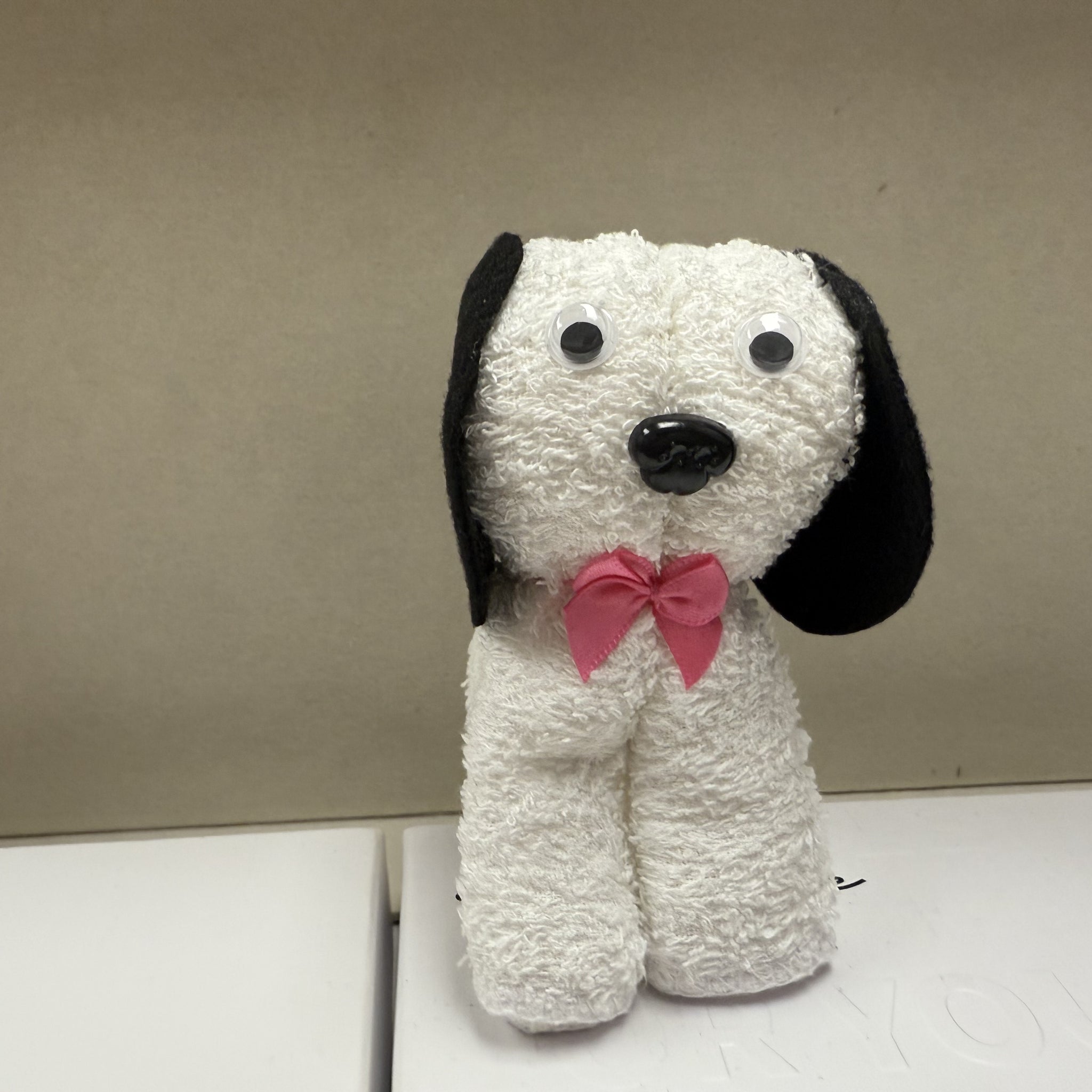 Boo boo buddy puppy with pink bow