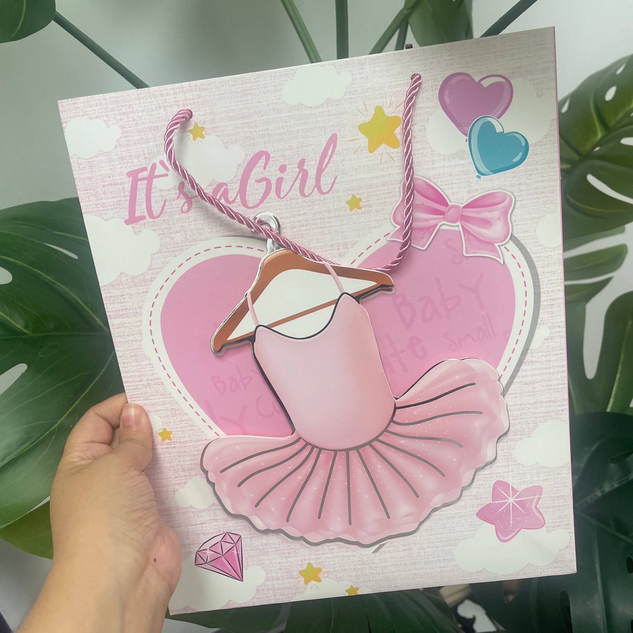 It’s a girl ballerina dress gift bag