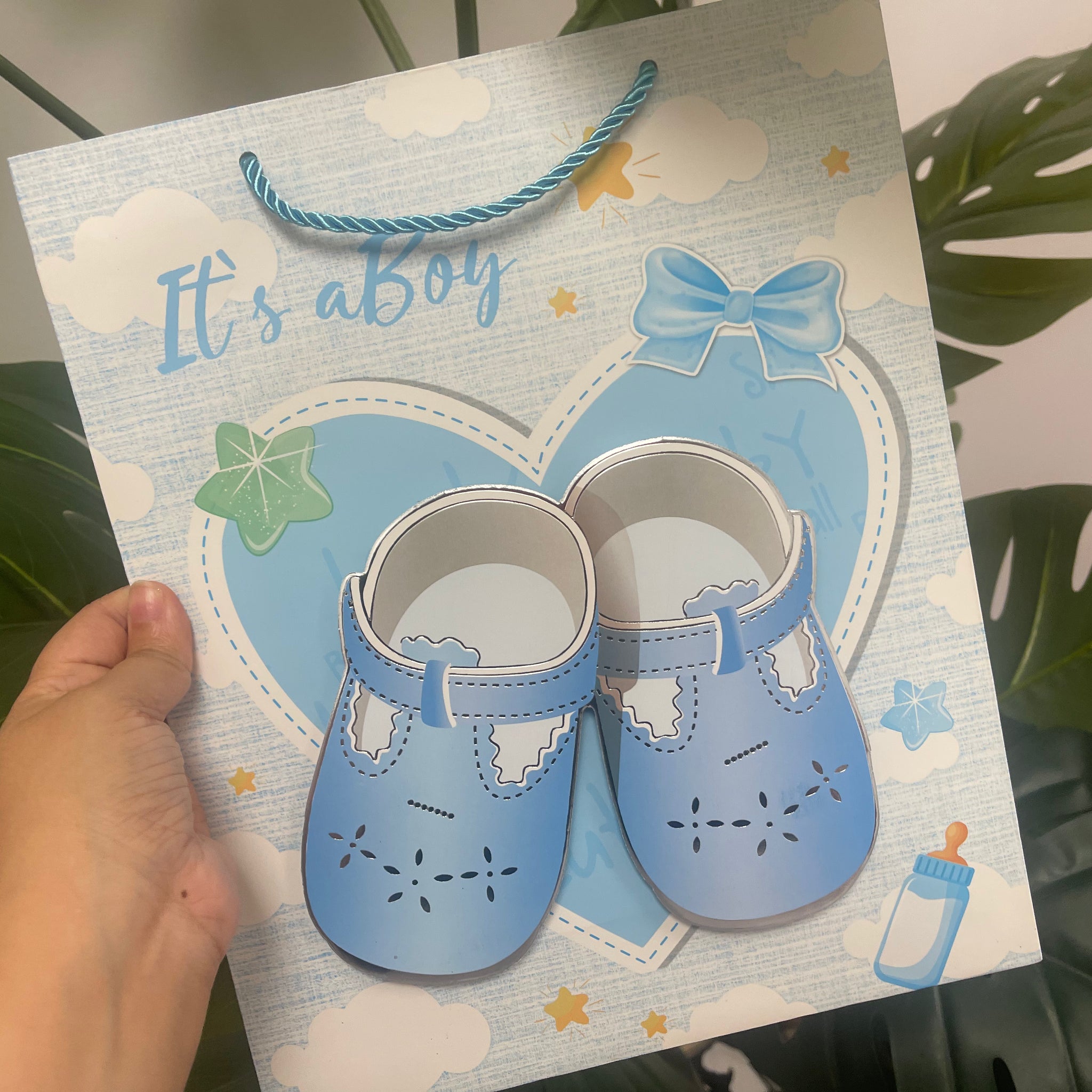It’s a boy baby shoes baby shower gift bag